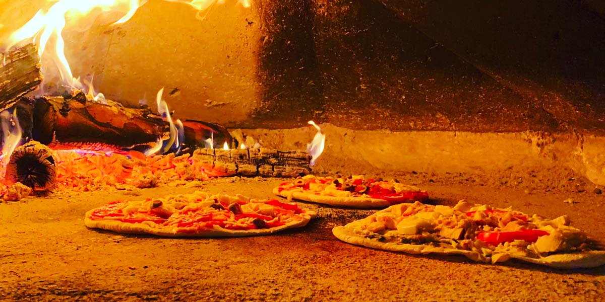 Pizza in a fire oven